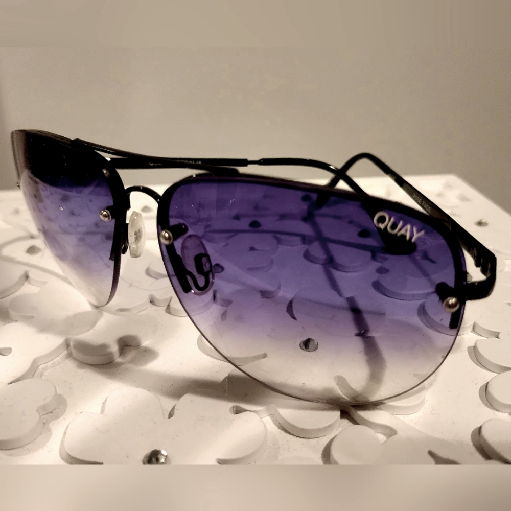 Quay Aviator Sunglasses. Gradient fade lens and metal arms.